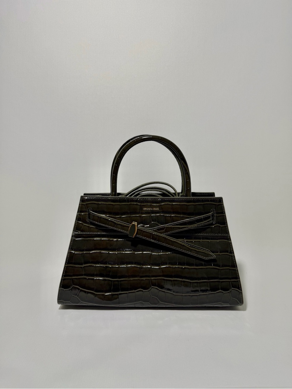 Veronica Beard Dash Bag
Green Croc-Embossed Leather Belted Handbag - Picture 2 of 10